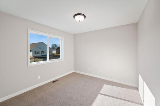 Bedroom - photo of a model home of the same floorplan. Selections may be different.