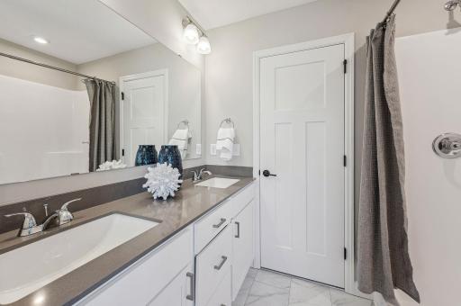 Primary Suite - photo of a staged model home of the same floorplan. Selections may be different.