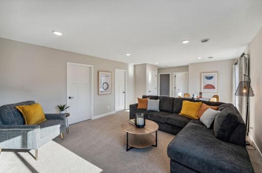 Lower Level Family Room - photo of a staged model home of the same floorplan. Selections may be different.