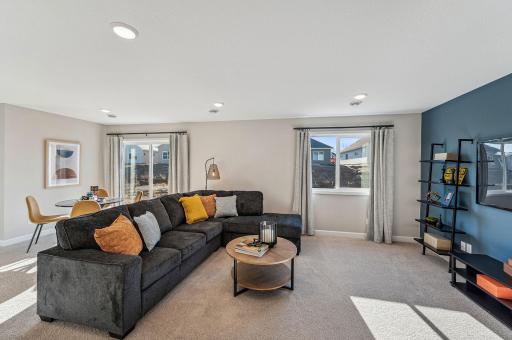 Lower Level Family Room - photo of a staged model home of the same floorplan. Selections may be different.