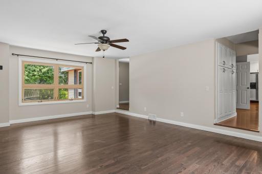 Living Room features engineered hardwood flooring with large windows