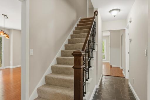 Upper Level features 5 bedrooms and 2 bathrooms + laundry room