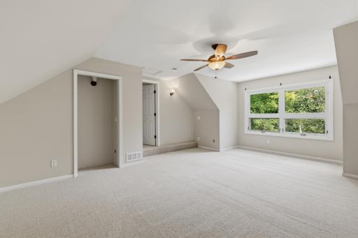 Bedroom 2 is spacious and features ceiling fan