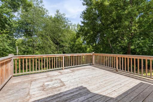 Deck measures 16 x 16 with stunning views of the backyard and mature trees