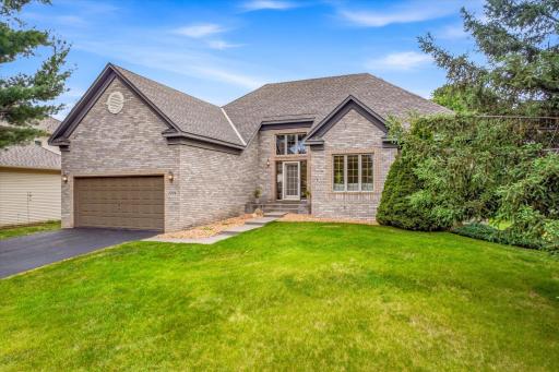 Stately Brick Facades elevate the homes in this established neighborhood.