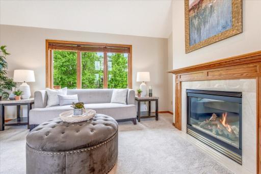Mature landscaping viewable from large windows throughout