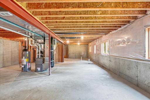 Large unfinished basement with mechanicals, garden level lookout windows - huge space for storage, storms, or additional living space