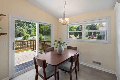 informal dinning room with sliding door to the deck