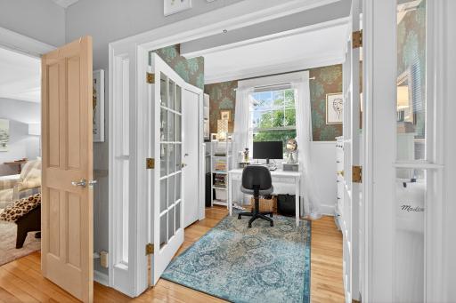 Office/sunroom in front bedroomwith French doors connected to first bedroom