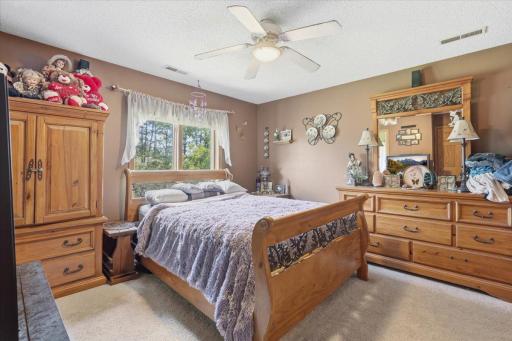 Spacious primary bedroom in the upper level