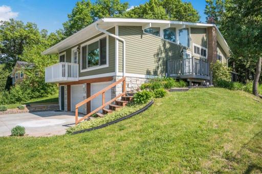 Composite siding, new roof, concrete driveway and new Andersen Windows