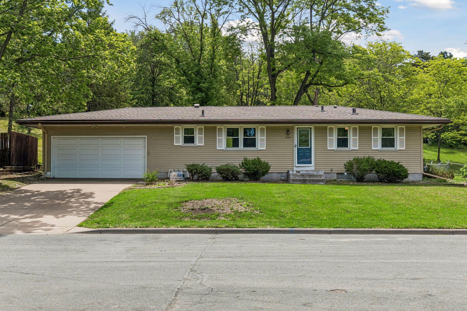 Wonderful rambler on a .6 acre lot with a 2 car attached garage and a concrete driveway