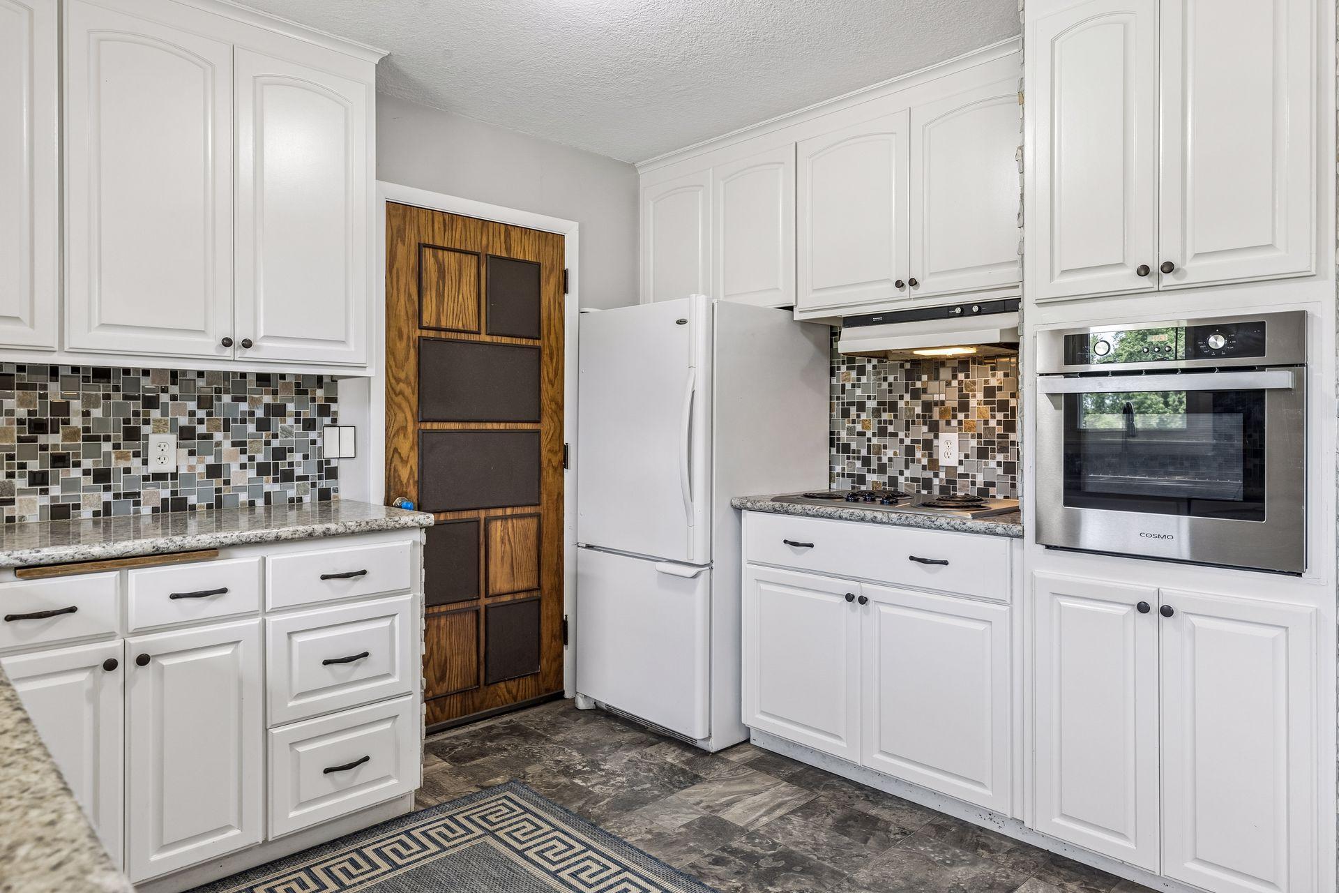 Nicely sized kitchen has room for a movable center island