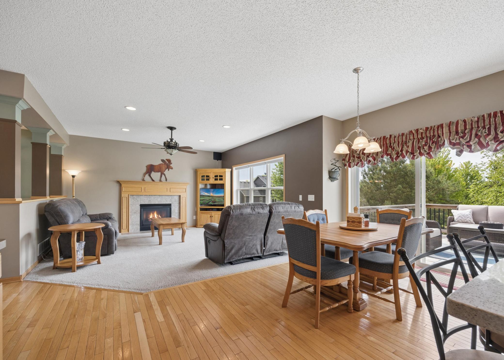 Informal dining area connects the kitchen, family room, and deck