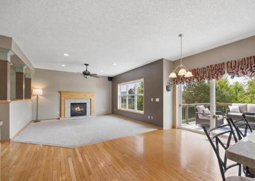 Open concept living, kitchen, and dining areas (Shown with furnishings virtually removed)