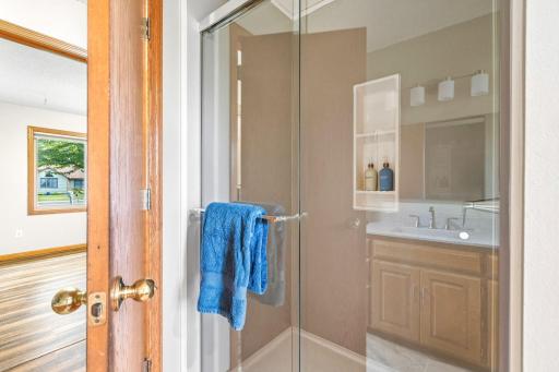 Separate shower in main floor bath.