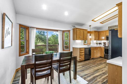 Informal dining area / eat in kitchen with walkout to the deck and backyard.