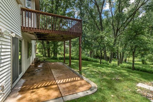 23x11 stamped concrete patio and 14x10 deck overlooking the expansive backyard.