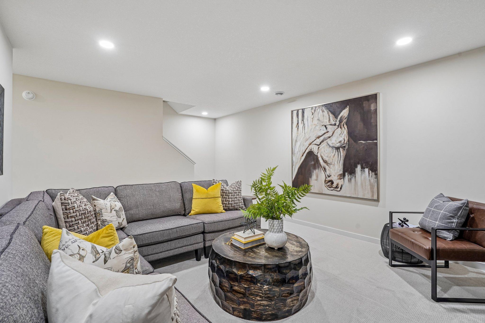 The finished lower level is an expanded entertaining space with family room, 4th bedroom and additional bathroom.