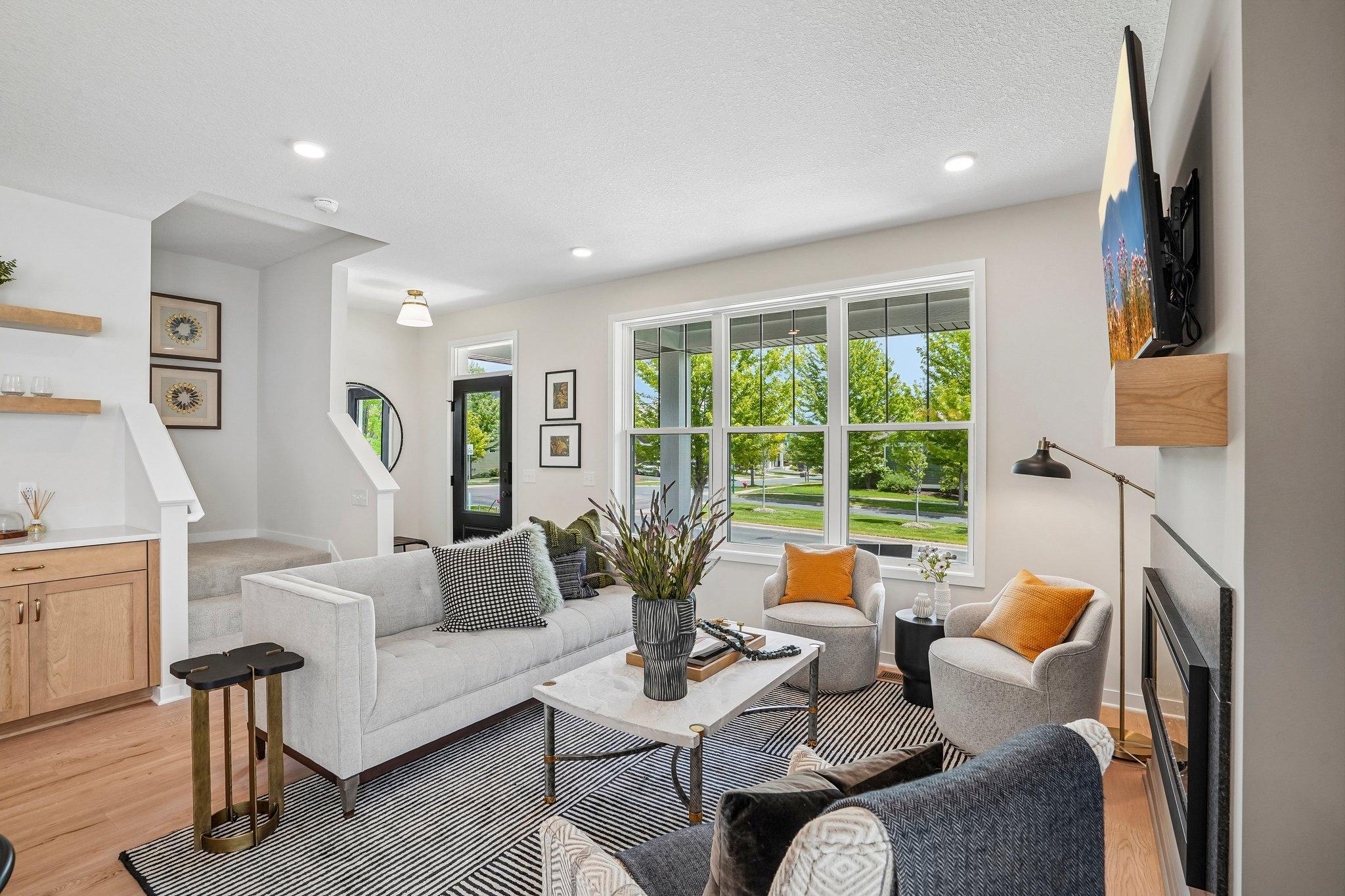 Gathering room with so much natural light to open up the space.