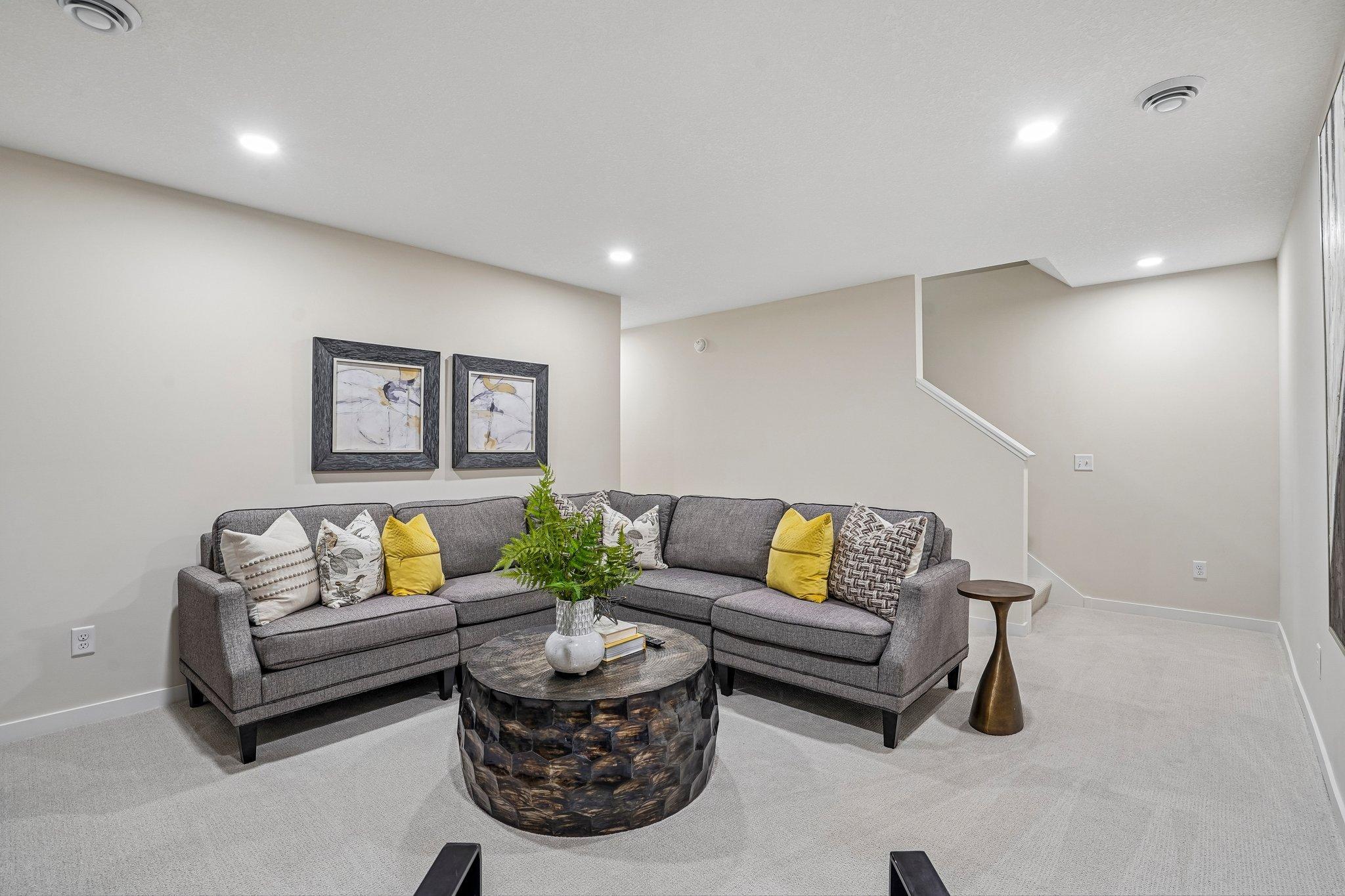 The finished lower level is an expanded entertaining space with family room, 4th bedroom and additional bathroom.