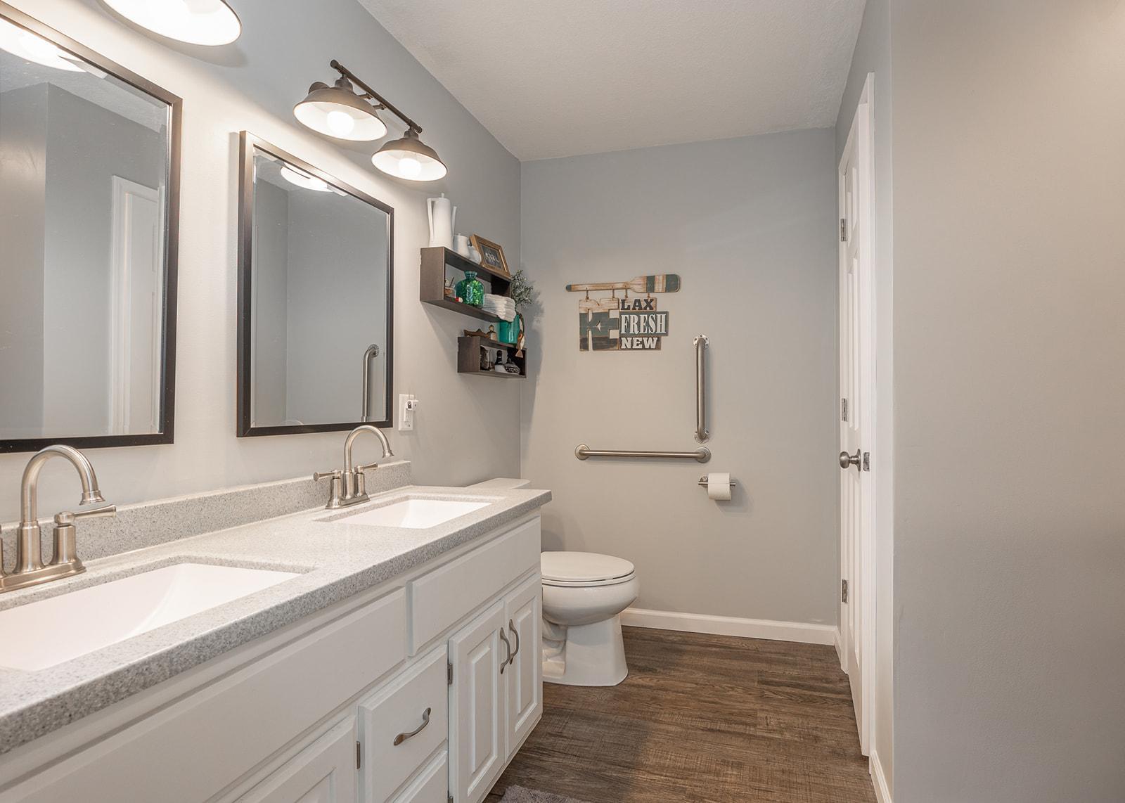 Large main floor bathroom with walk in tile shower