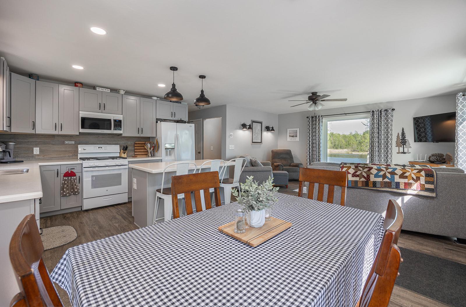 Kitchen and dining open up to spacious living room
