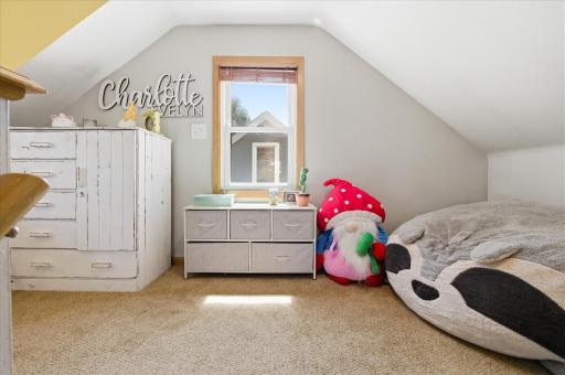 Upstairs is open for possibilities ... currently set up as child's bedroom and play area. Would make a wonderful primary suite!