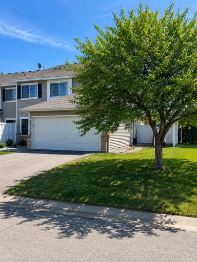 End unit/corner unit offering added privacy and extensive green space