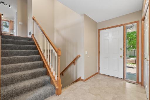 Another view of the spacious foyer, featuring a huge closet with plenty of room for coats, shoes, seasonal gear, and extra storage.