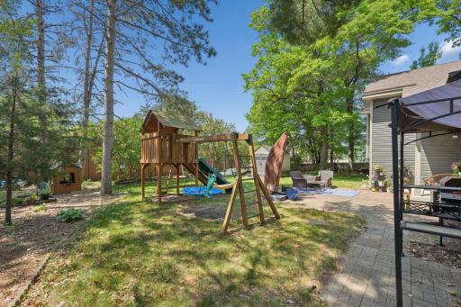 Enjoy your own private backyard oasis! The playset and playhouse are included with the home, creating a fun outdoor space.