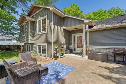 Convenient access to the backyard from the foyer leads to a large patio, offering the perfect space for relaxing, grilling, or entertaining family and friends.