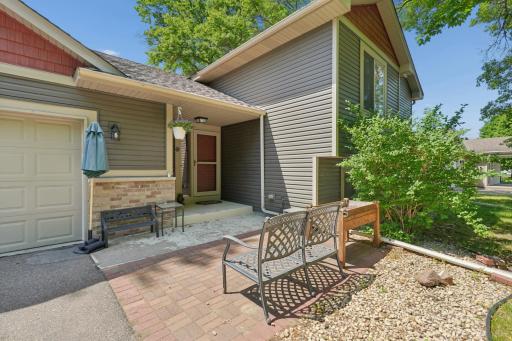Enjoy the inviting front patio-and ideal place to sit, relax, and greet neighbors.