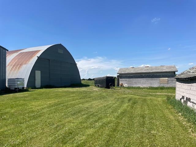 Quonset and corn crib.