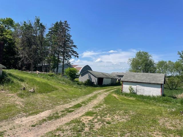 Small shed on right side of second driveway is on this property, too!