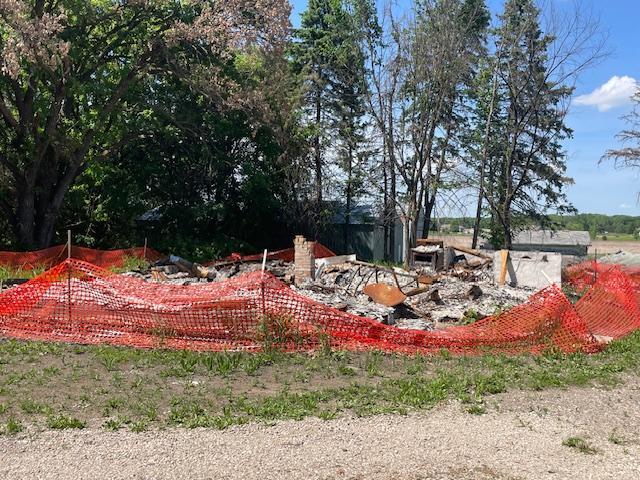 Remains after farmhouse was burned down