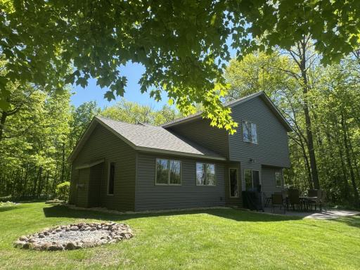 Rear of house, firepit, exposed aggregate patio