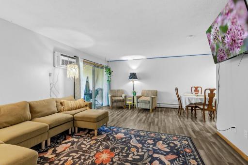 Living, Dining and Kitchen open to one another.