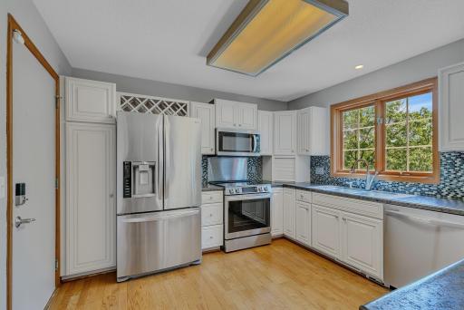 Stainless steel appliances - induction range new 2025, and microwave new 2023.