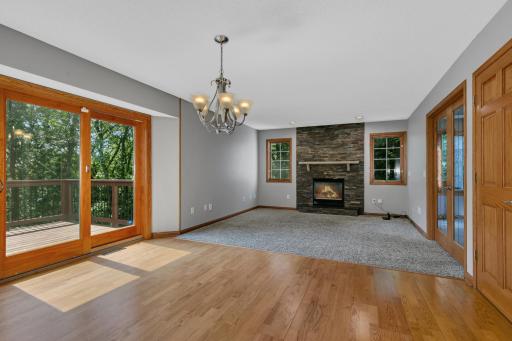 Inviting floor plan enhanced by abundant natural light, recessed lighting, and numerous updated light fixtures.