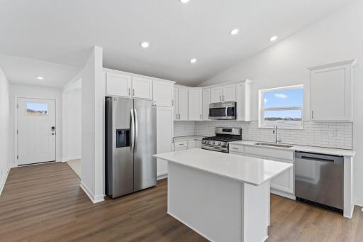 Photo of a similar home, actual finishes may vary