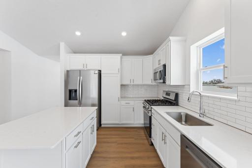 Photo of a similar home, actual finishes may vary
