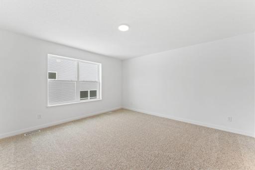 Photo of a similar home, actual finishes may vary
