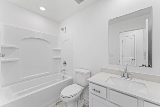 Photo of a similar home, actual finishes may vary
