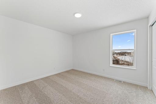 Photo of a similar home, actual finishes may vary