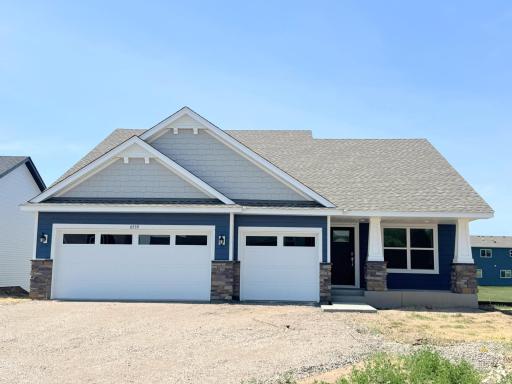 Welcome to 8559 Farmstead Ave NE! (Photo is of the actual home in progress.)
