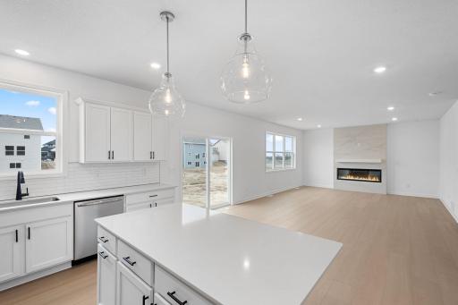 The center island overlooks the dining room and Great Room to promote seamless everyday living