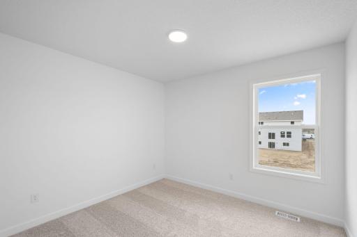 All the secondary bedrooms include a practical wardrobe closet and wall-to-wall carpeting for plush comfort.