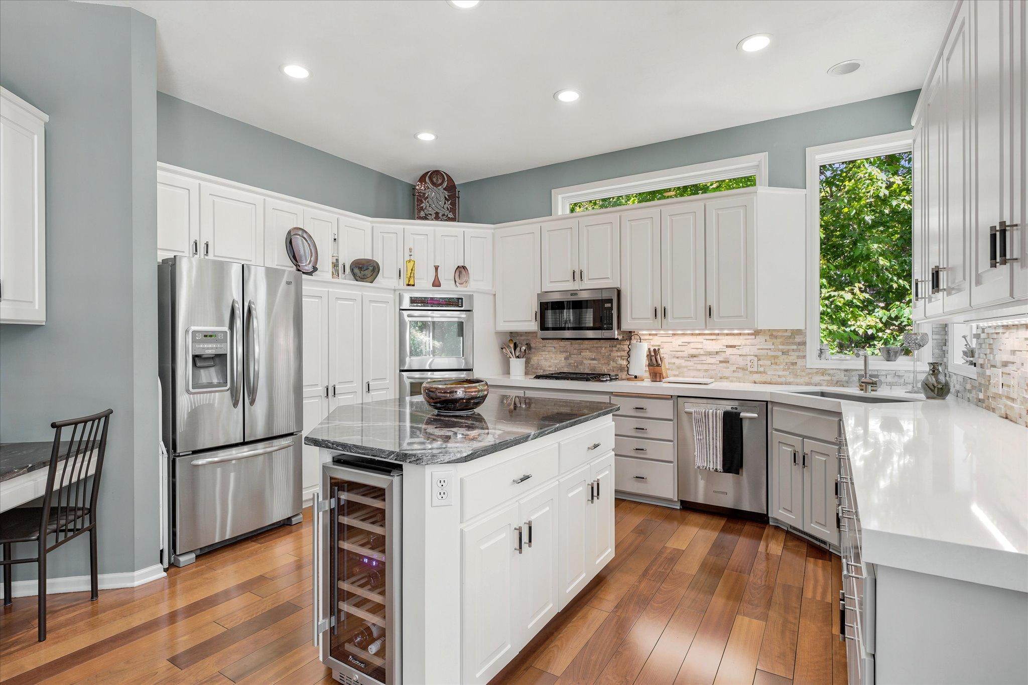 Bright, White enameled Millwork Kitchen
