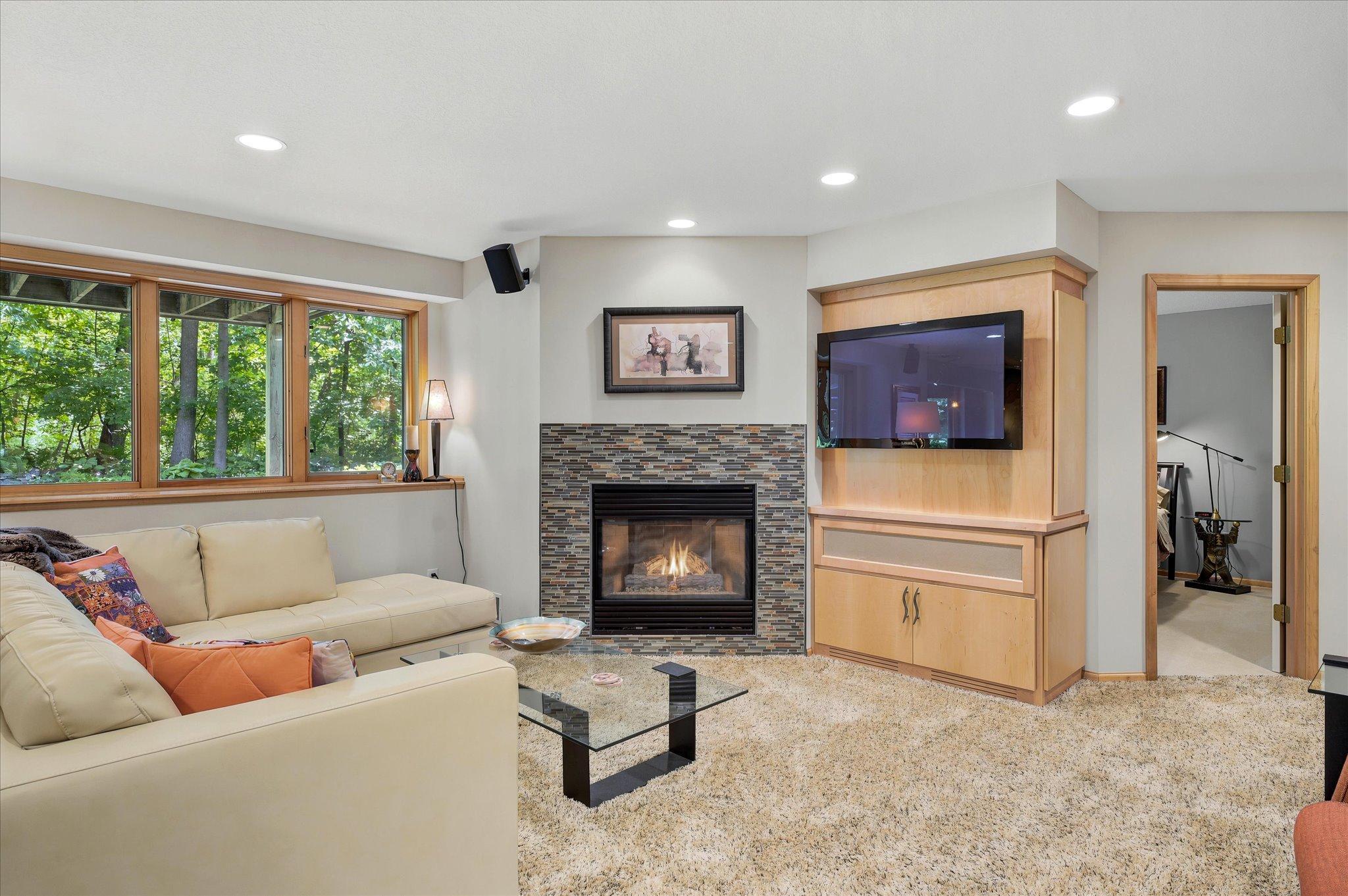 Lower Level Gas Fireplace & built-in